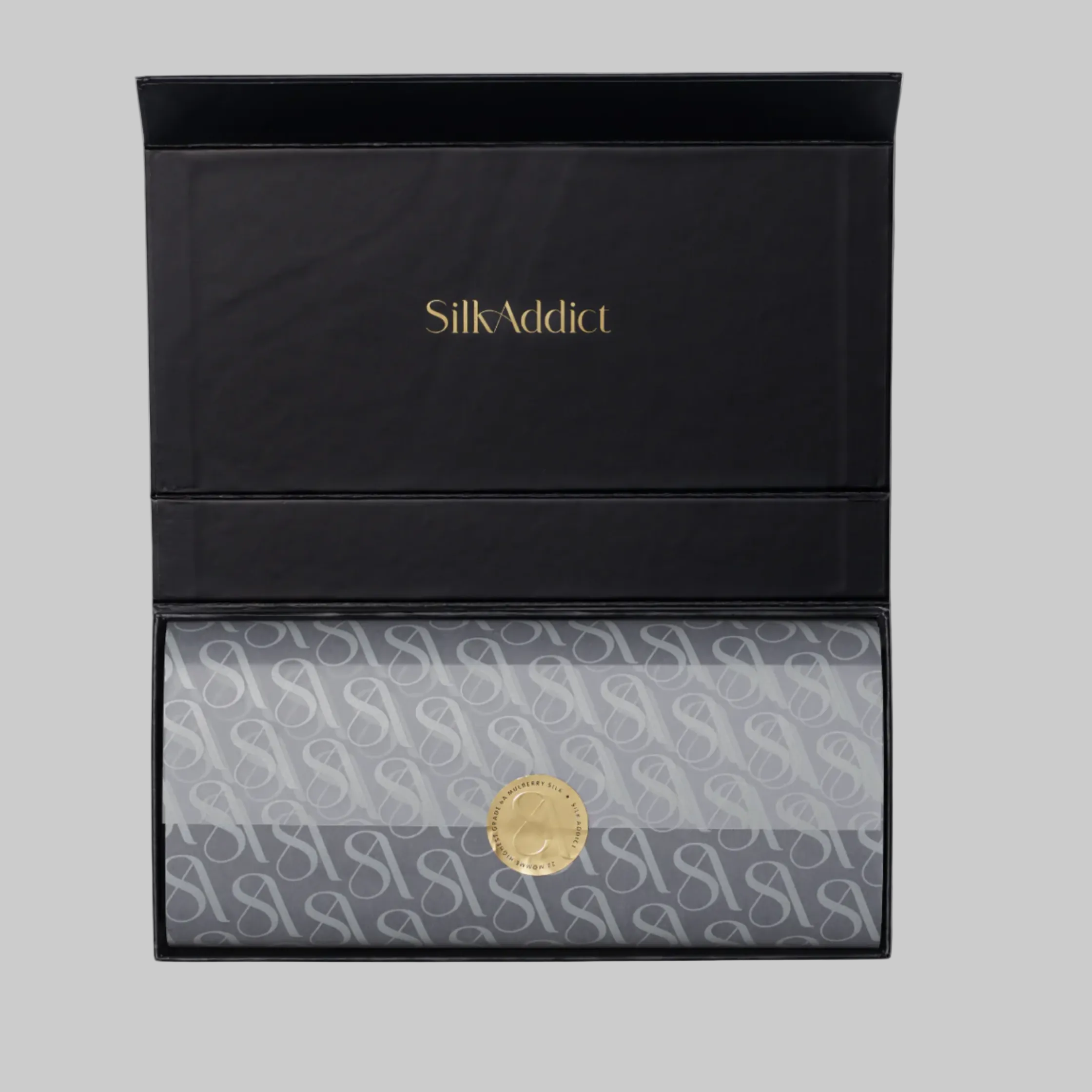 Black and gray pouch with 'Silk Addict' branding on a white background